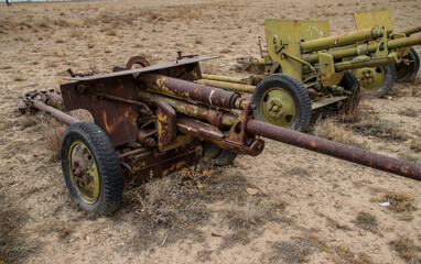 Old armoured vehicles military escorts, guns and tanks in Gardez in Afghanistan