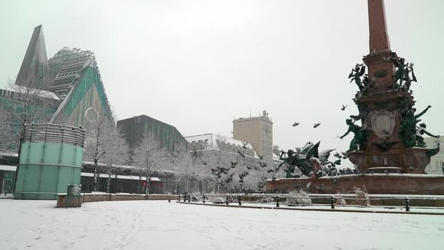 City centre of Leipzig in Saxony, Germany on a Winter day during snowfall