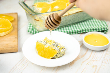 Healthy dessert. Cheesecake with poppy seeds and oranges