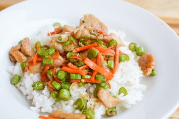 pork and vegetable fried on hot rice - Thailand healthy food