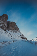 Fototapeta na wymiar Winter landscape, mountains peaks covered by snow and rocks