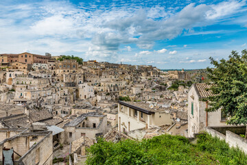 Fototapeta na wymiar Panoramic view of the Sasso Barisano in Matera, Italy, part of the Sassi and the Park of the Rupestrian Churches of Matera, a UNESCO World Heritage site
