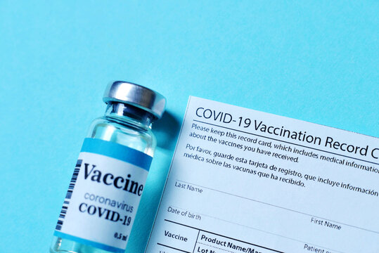 Immune passport or certificate for travel concept. 2019-ncov Covid-19 Corona Virus drug vaccine vial medicine bottles syringe injection. SARS-CoV-2 Vaccination, immunization