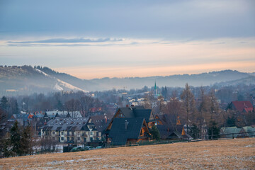 Scenic view of a wonderful valley in the mountains with rural farm house buildings