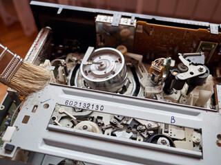 Cleaning and repair of the tape of the extended mechanism of VHS player