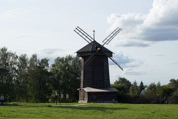 Fototapeta na wymiar old windmill in the country in summer 