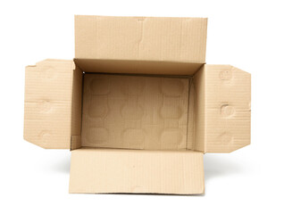 open empty cardboard rectangular box made of corrugated brown paper isolated on a white background