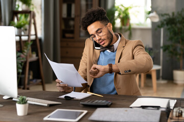 Businessman busy at office