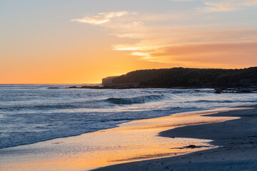 Obraz premium Sunset over the beach