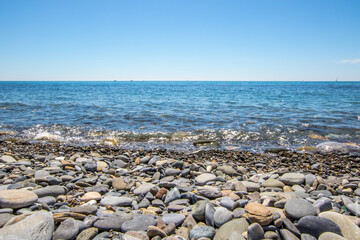 Fototapeta na wymiar stone beach on the coast of sochi