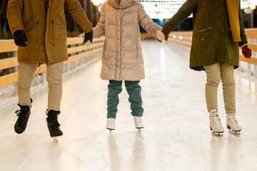 Family with child skating