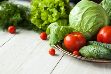 Healthy food concept. Fresh vegetables on a white wooden background. Healthy eating. View from above. Copy space.