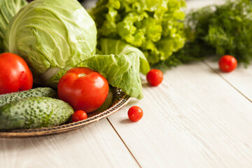 Healthy food concept. Fresh vegetables on a white wooden background. Healthy eating. View from above. Copy space.