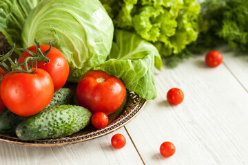 Healthy food concept. Fresh vegetables on a white wooden background. Healthy eating. View from above. Copy space.