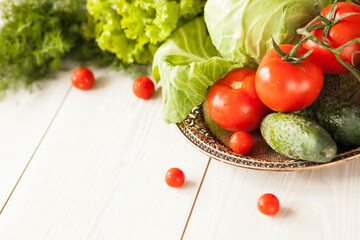 Healthy food concept. Fresh vegetables on a white wooden background. Healthy eating. View from above. Copy space.