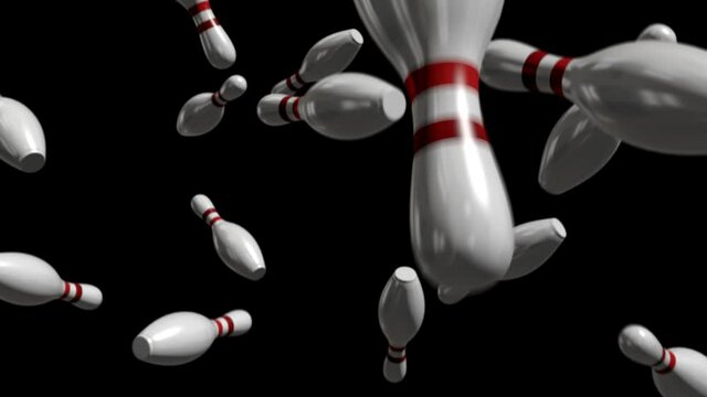 Falling bowling pins isolated