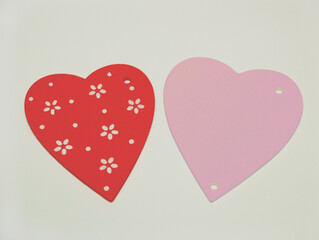 Pink and red hearts on a light background. Valentine's day. 