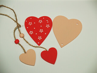 Pink and red hearts on a light background. Valentine's day. 