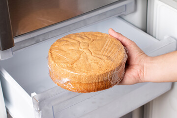 Fresh sponge cake. Frozen sponge cake in the freezer.