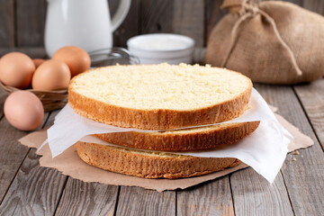 Clasic sponge cake on wood table. Homemade cake