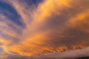 Fototapeta na wymiar orange and red clouds at sunset