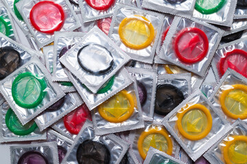 Colorful condoms background.