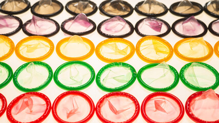 Colorful condoms background.