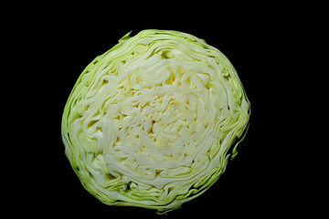 Half cut cabbage with black background