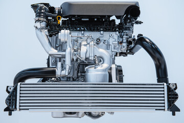 Car engine, concept of modern vehicle motor with metal, chrome, plastic parts, heavy industry, blue...