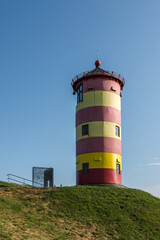 Fototapeta na wymiar Pilsumer Leuchtturm, Pilsum, Krummhörn, Ostfriesland, Niedersachsen, Deutschland