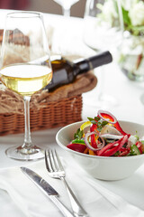 Classic Greek salad. Banquet festive dishes. Gourmet restaurant menu. White background.