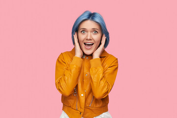 Surprised young woman screaming in excitement