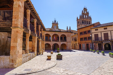 Fototapeta na wymiar Church and Town Hall in the town square. Ayllon, Segovia, Spain. 
