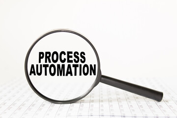 words PROCESS AUTOMATION in a magnifying glass on a white background. business concept