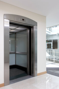 Empty lift with open doors, UK.