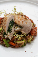 Baked chicken breast with quinoa rice. Healthy food