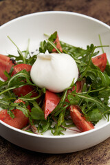 Mozzarella burrata salad with shrimp, arugula leaves