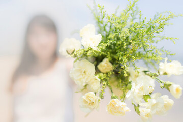 blooming bouquet with blurred bride background