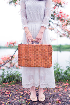  Close Up Woman Holding Wicker Briefcase