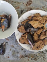 Mussels bowl on white baking paper