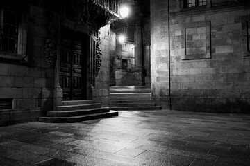 Reflections in a lonely street in Santiago de Compostela on a rainy night