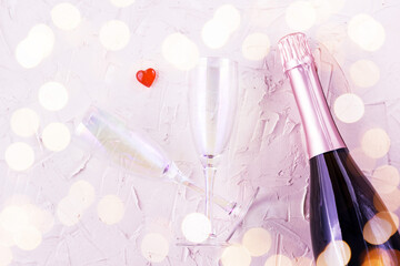 Valentines card with champagne glasses and bottle, heart and gift on white background