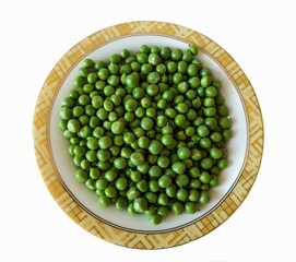 Peeled peas in a plate, isolated vegetable.