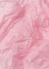 Texture of Creased pink tissue paper for gift wrapping