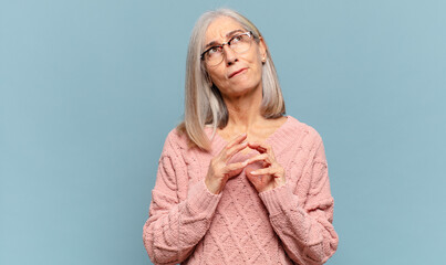middle age woman scheming and conspiring, thinking devious tricks and cheats, cunning and betraying