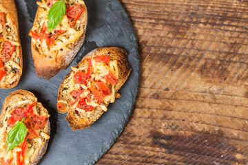 italian bruschetta with roasted tomatoes mozzarella cheese