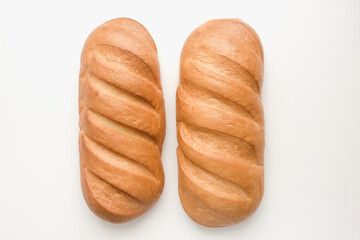 loaf on a white background , sliced loaf , bakery products