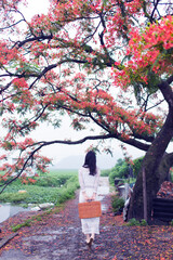 relaxed woman walking outdoors