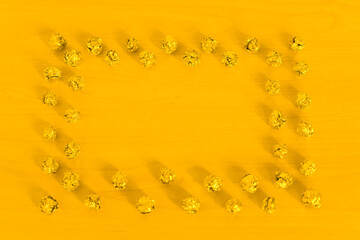 simple background with frame. Decorative light metallic backdrop in gold and yellow colors. Cool...