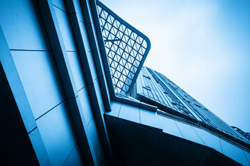 Looking Up Blue Modern Office Building